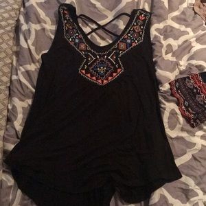 Black flowy tank with pattern on the collar
